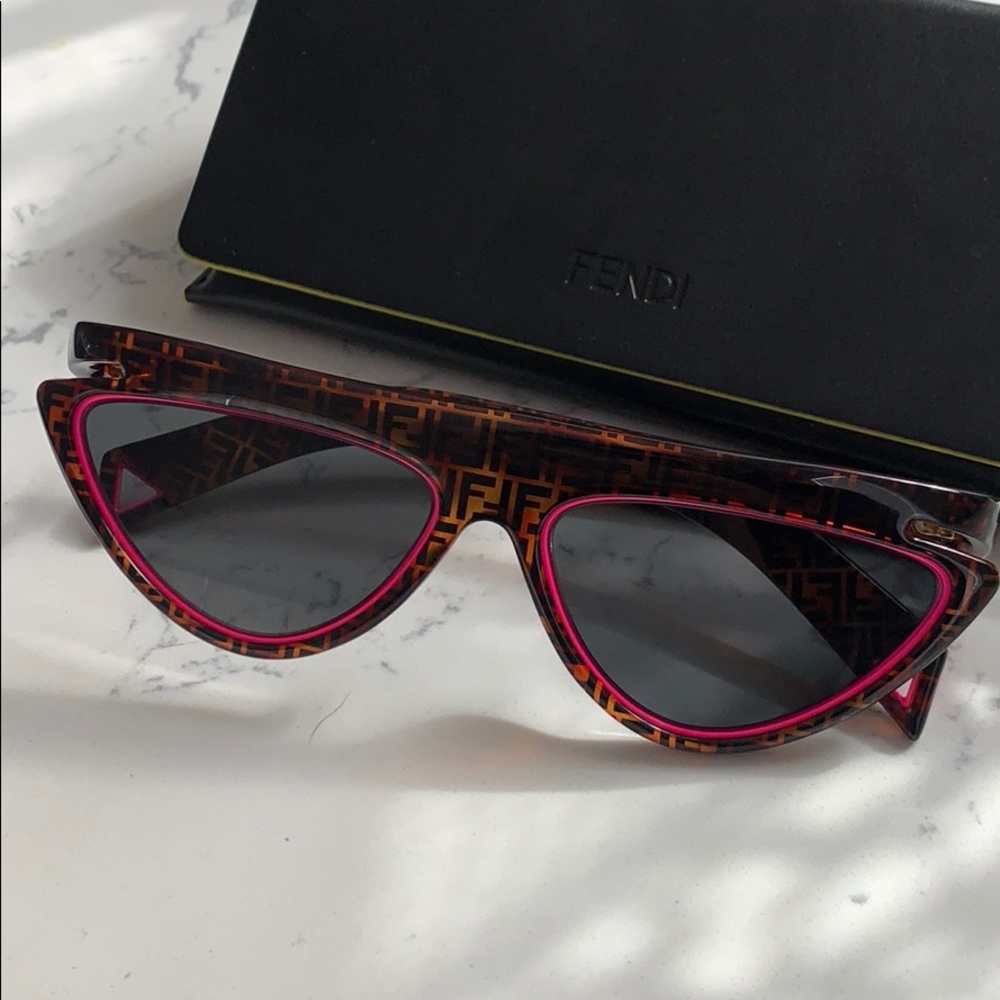 Brand New Fendi Sunglasses with neon pink trim.